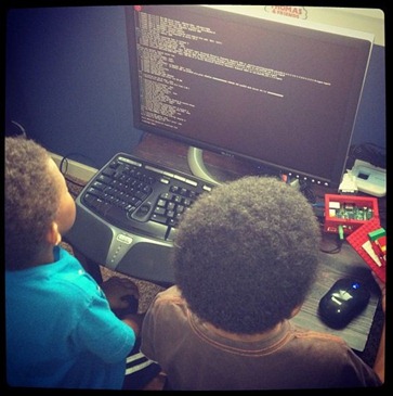 Two little boys on a Raspberry PI